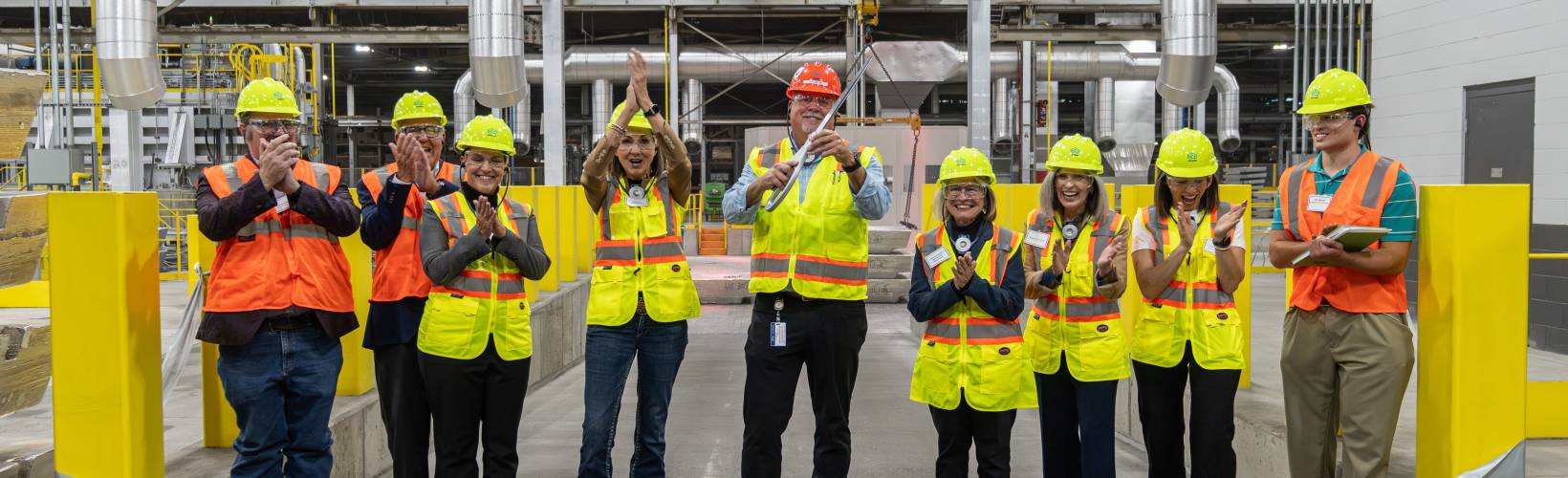 People clapping at the Arconic ribbon-cutting