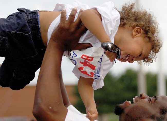 Father holding his son in the air