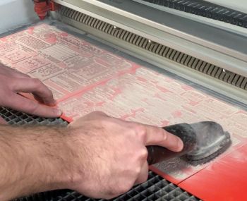 RubberStamps.Net rises out of the ashes in new Downtown Davenport location